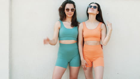 two women in matching activewear