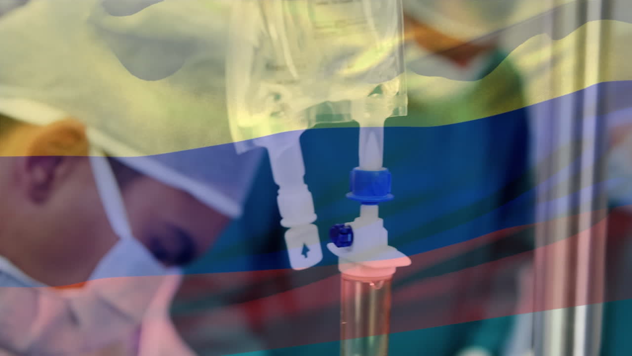 animación de la bandera de colombia ondeando sobre los cirujanos en el quirófano