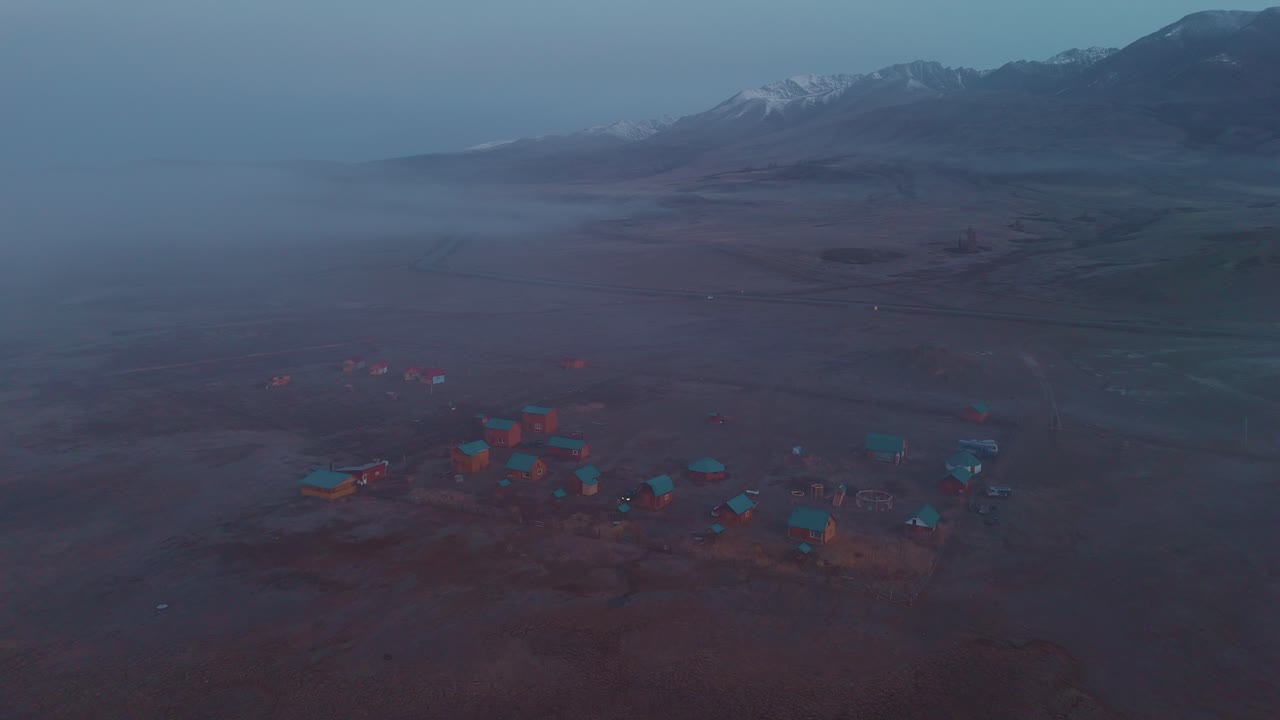 Mountain Village in Misty Dawn