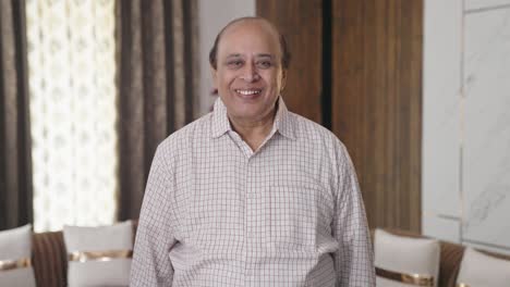 Old-Indian-man-smiling-to-the-camera