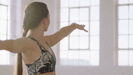 beautiful yoga woman exercising healthy lifestyle practicing extended side angle pose enjoying workout in studio training mindfulness breathing exercise