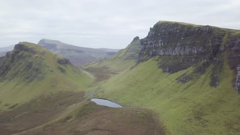 an aerial video of the quiraing on the isle of skye in scotland. it flies over the famous part of the unique geological area.