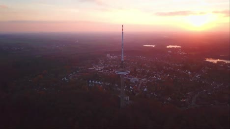 kiel transmission tv tower with a reddish evening sky, germany