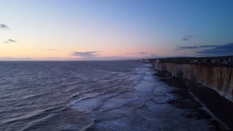 wide angle aerial view chalk cliffs on south coast of england at sunset