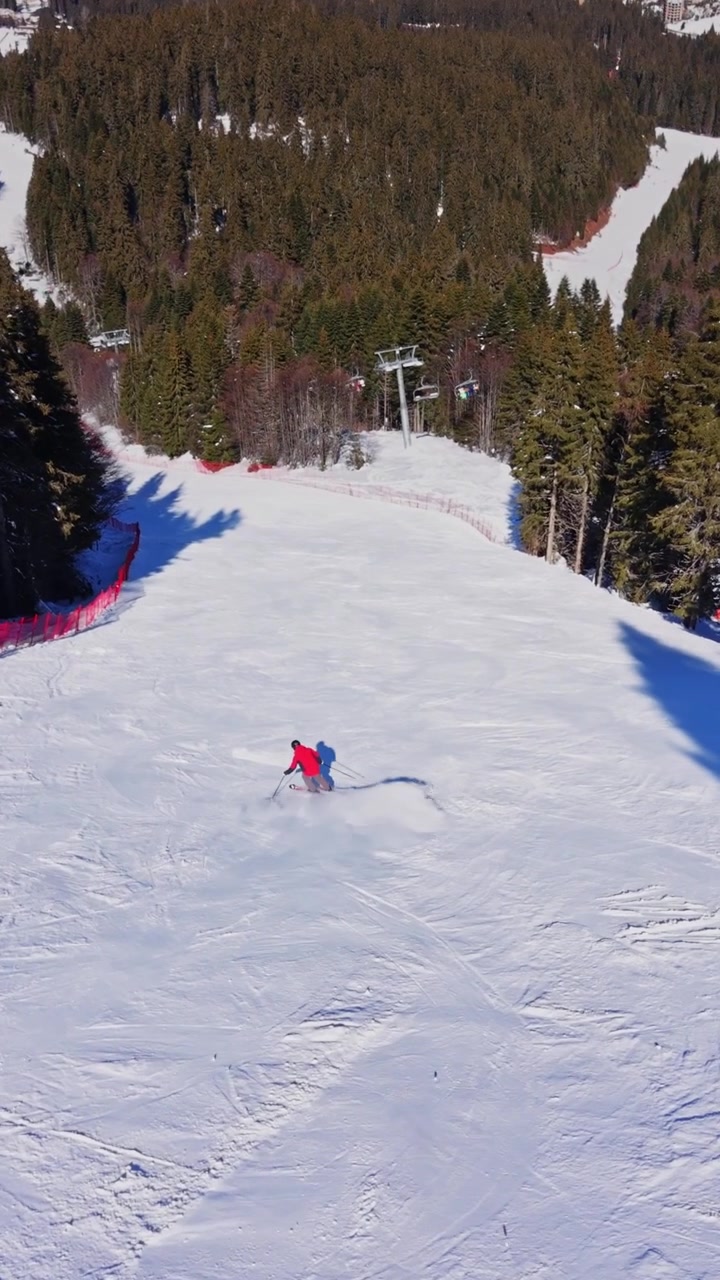 Skiing on the slopes in the Carpathians of Bulgaria during winter
