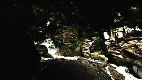 Looking-at-the-waterfall-in-Thailand.