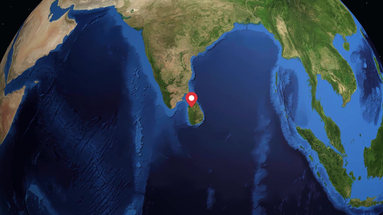 Digital globe rotates and zooms into Sri Lanka, highlighting Anuradhapura with a geographic information box