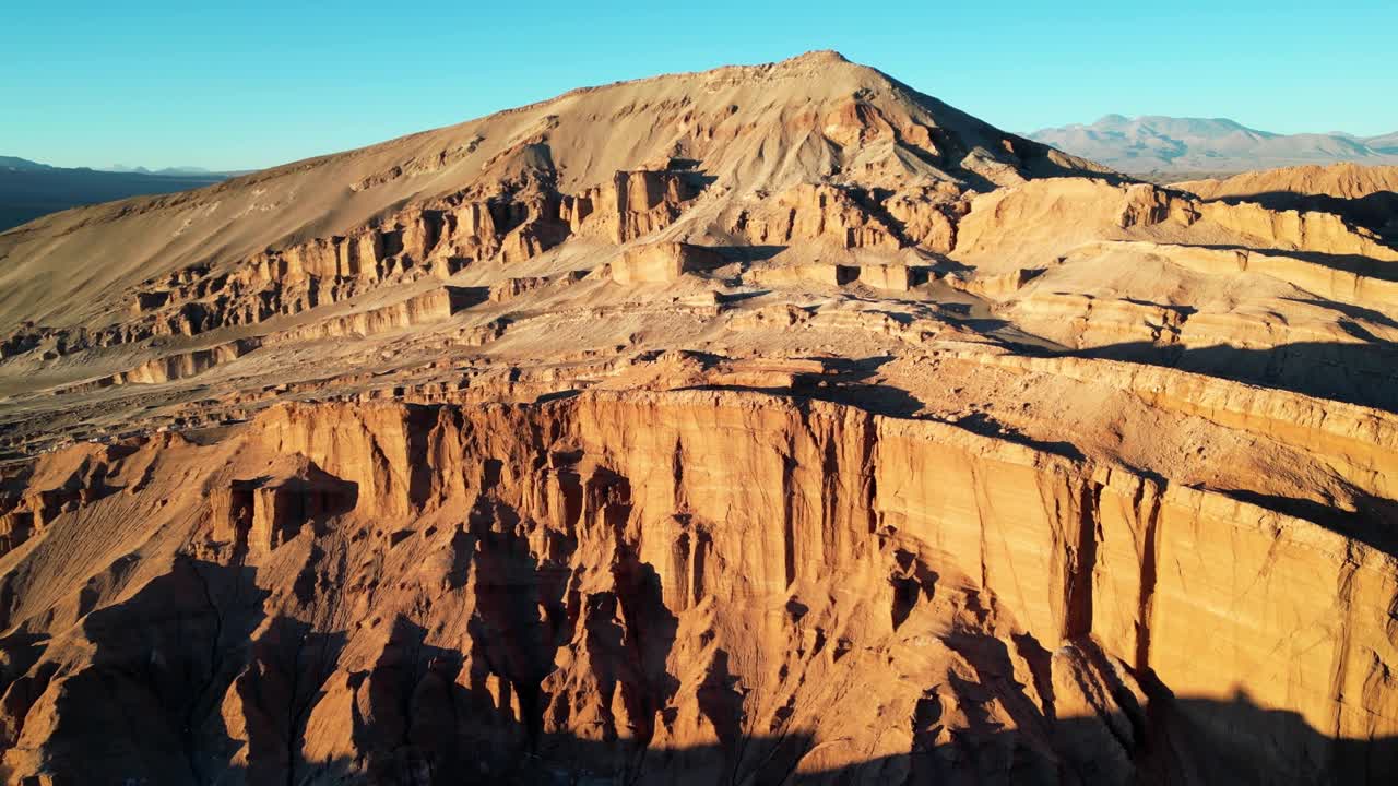 Majestic 4K aerial clip showcasing the Valley of the Moon’s iconic ridges and flatlands glowing in golden light
