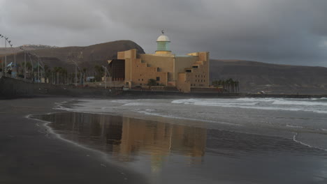 general sunrise shot of the alfredo kraus auditorium from las canteras beach