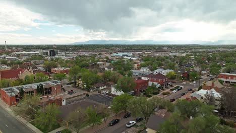 panoramic aerial estabilshing overview of pueblo colorado city suburbs on overcast day