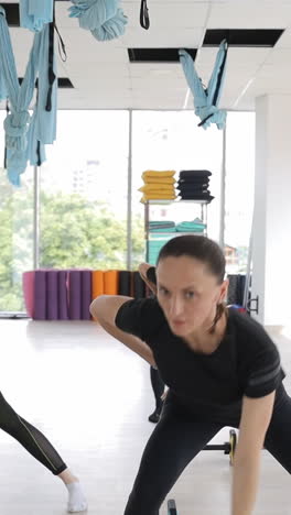 beautiful athletic women working out in a fitness club group strength training for women beautiful athletic women working out in a fitness club group strength training for women keeping fit healthy lifestyle
