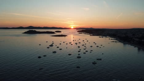 Colorful-landscape-with-boats-in-marina-bay,-sea,-colorful-sky-in-golden-hours