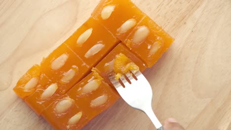 close up of indian sweet in a bowl on table.