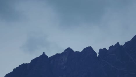 mountain peaks in the clouds