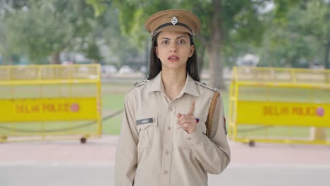 Indian-female-police-officer-talking