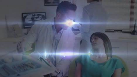 Animation-of-light-trails-over-diverse-doctor-and-patient