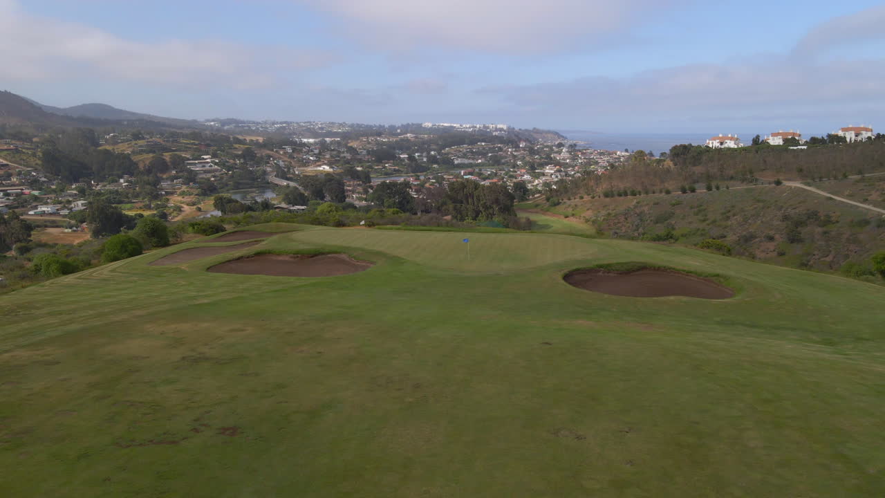 AERIAL - Golf course in Zapallar, Valparaiso, Chile, wide forward shot