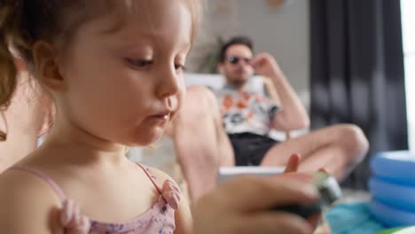 close up video of little girl eating a watermelon