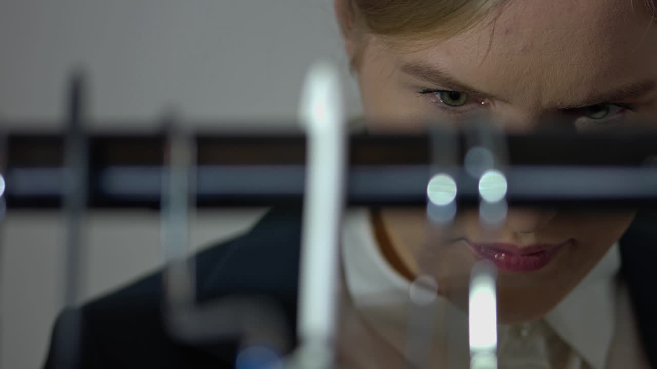 Zero waste concept. Woman on swap meet checking clothes on hangers