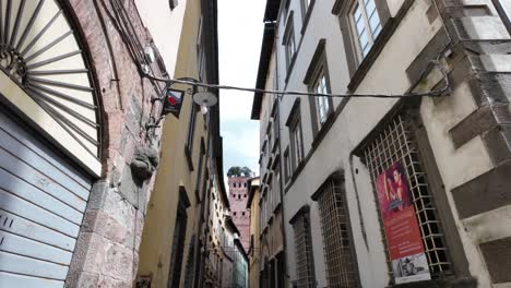 street in italy, lucca city narrow side alley stable video shot day time
