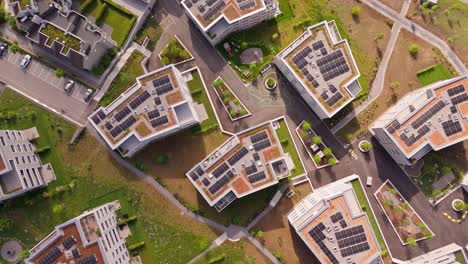 modern swiss buildings with solar roofs in wil, st. gallen, seen from above
