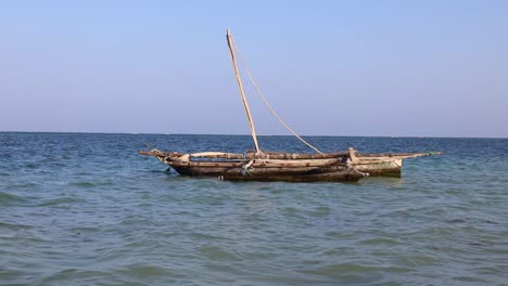 a traditional boat at diani beach - galu beach - kenya, africa