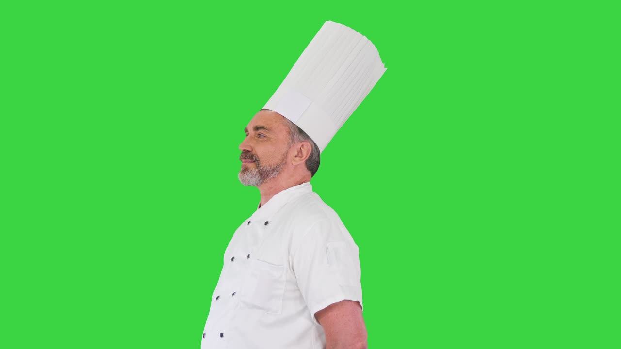 Chef caucasico fiducioso in piedi senza fare nulla su uno schermo verde, Chroma Key