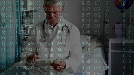 animation of financial data processing over caucasian male doctor using tablet