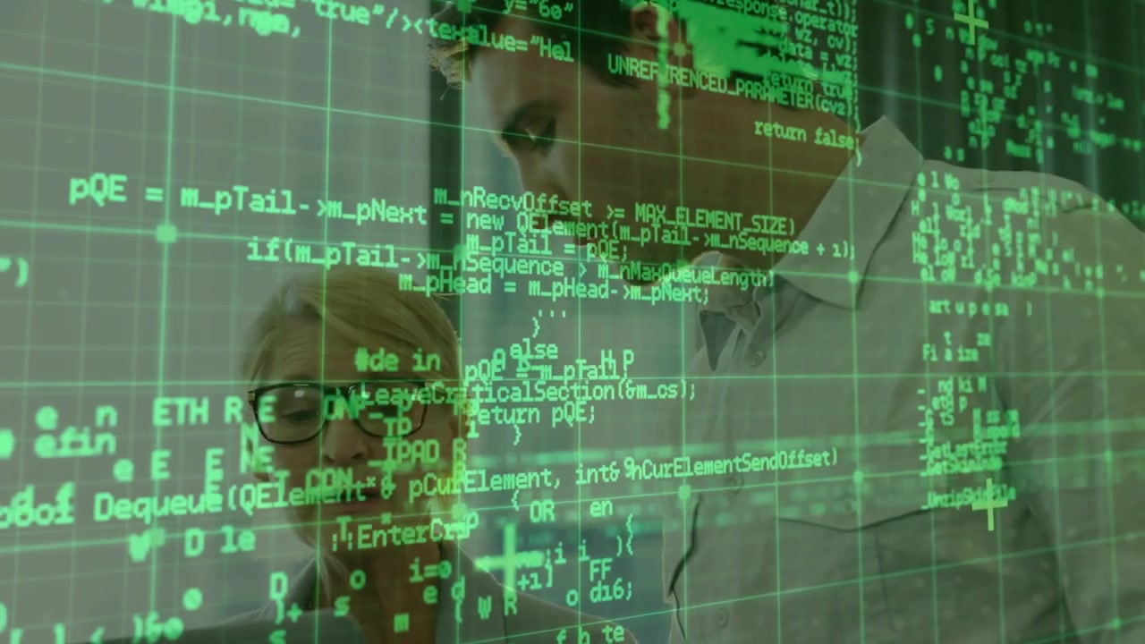 Colleagues Collaborating on Software Development in Modern Office