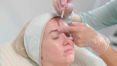 botox injection procedure in the modern cosmetology clinic. botulinum therapy