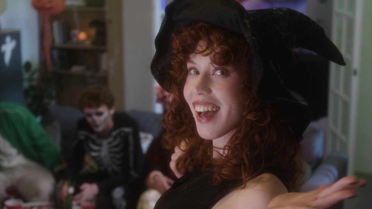 Halloween Party with Woman in Witch Costume