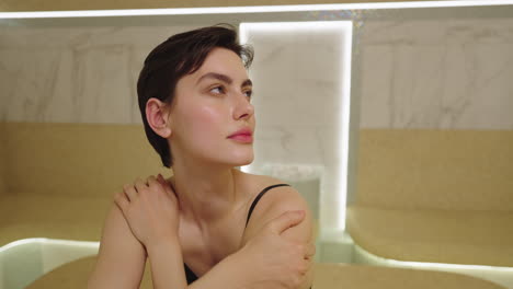 Woman Relaxing in a Modern Spa