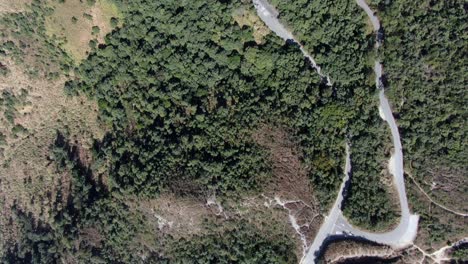 High-altitude-early-morning-shot-over-Hong-Kong-Lion-rock-mountain-ridge-trail,-Aerial-view