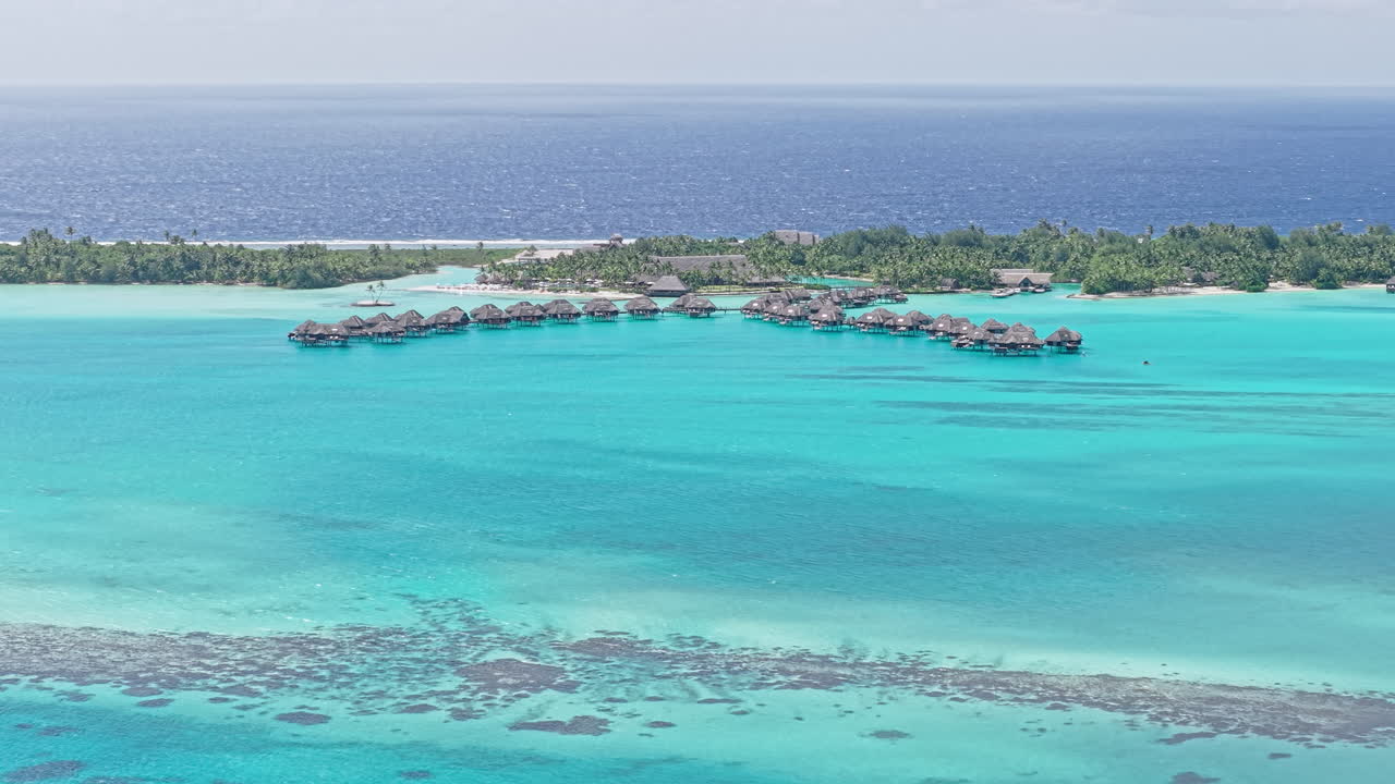 Bora Bora Island Lagoon and Luxury Resort With Overwater Bungalows, French Polynesia, Drone Shot