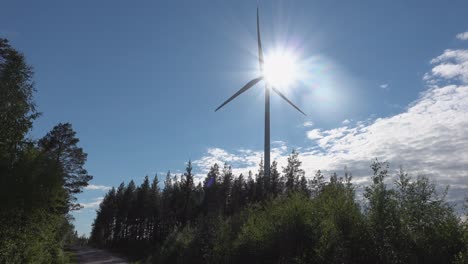 windmill against the sun
