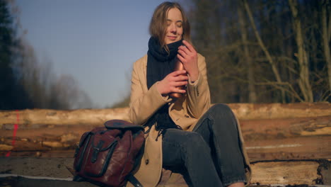 positive female hiker relaxing