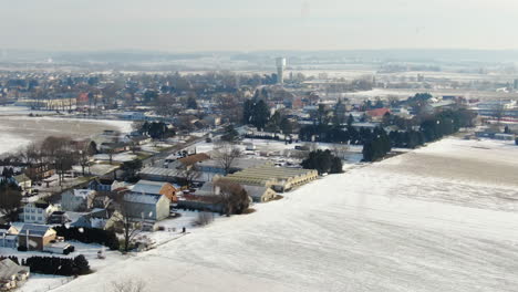 AERIAL-Snow-Falling-Over-Lancaster-County-Township-Of-Intercourse