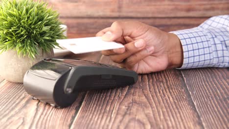 person paying with a credit card