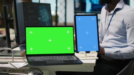 startup office admin reviewing ai system metrics on isolated screen devices