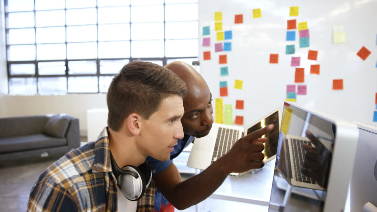 Casual colleagues using technology