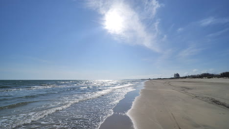 empty beach la grande-motte south of france sunny winter day