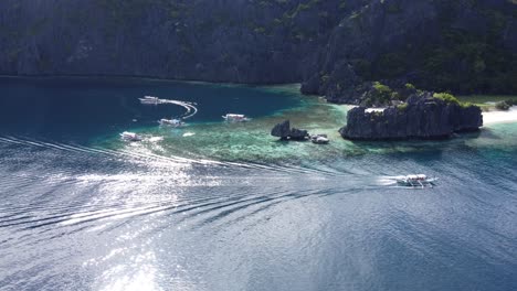 Tour-boats-Traffic-at-Star-Beach---Tapiutan-Island,-part-of-Island-hopping-Tour-C-in-El-Nido,-palawan-philippines