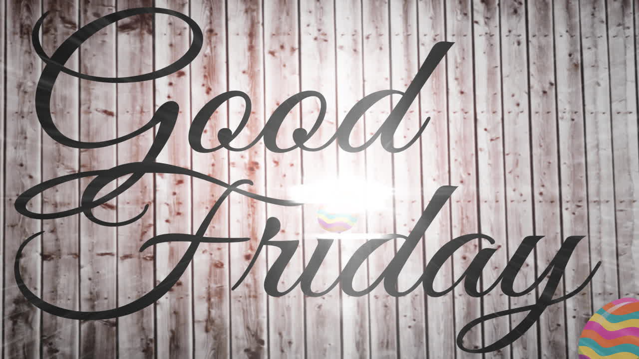Animation of good friday text with easter egg on wooden background