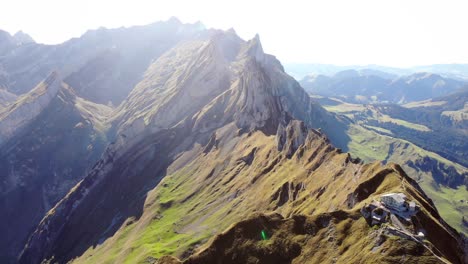 Aerial-view-of-Schaefler-ridge-in-Appenzell,-Switzerland-on-a-sunny-afternoon