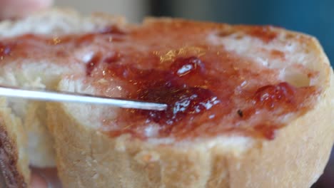 slice of bread with strawberry jam
