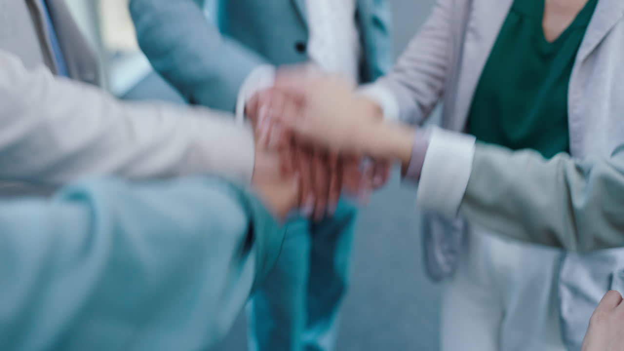 Celebration, hands stack and business people