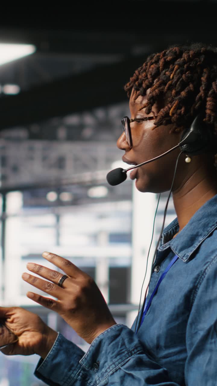 Vertical video Server hub IT expert monitors systems, doing tech support