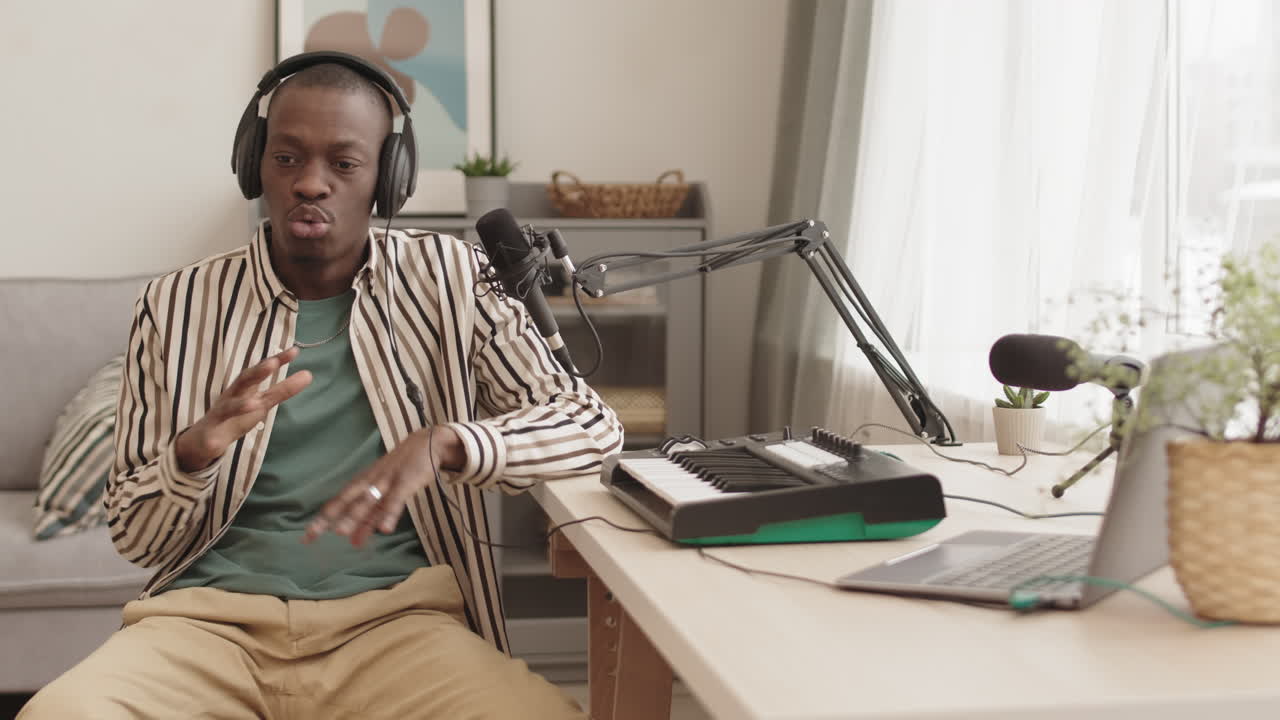 African American Young Man Recording Song