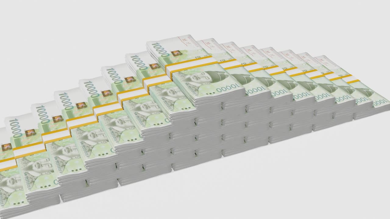 Many wads of money. 10000 South Korean Won banknotes. Stacks of money.