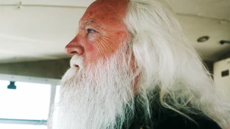 thoughtful fisherman sitting in fishing boat